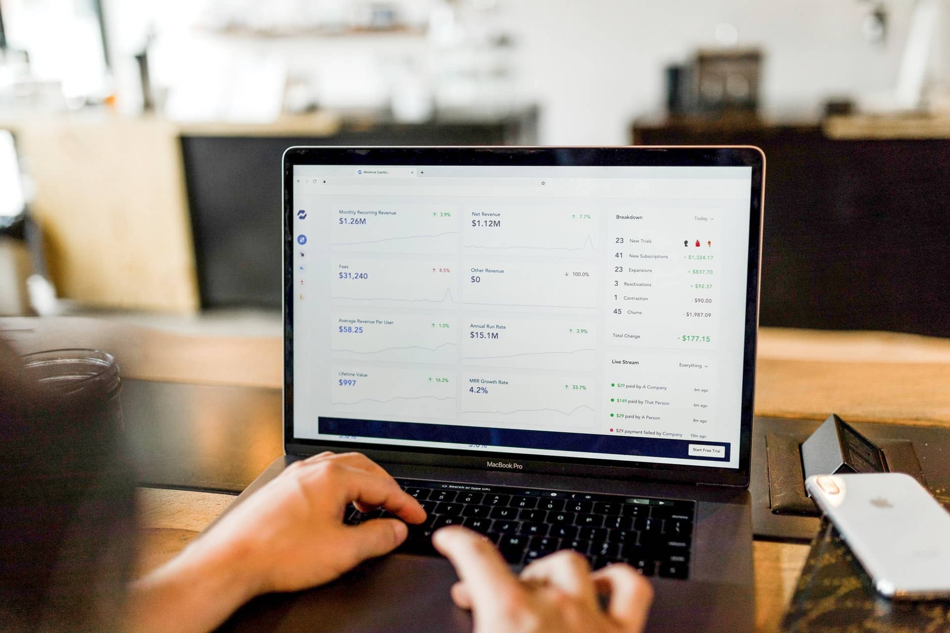 Person checking mortgage rates on laptop 