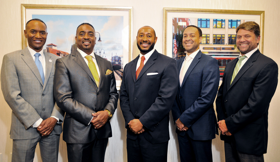 NCCU Unity Scholarship. From left: Anthony Nelson, NCCU School of Business; James Montague, F7 International Development; Brooks Splawn, F&M Bank; Andre Johnson, Andre Johnson Architects; A.J. Critelli, F&M Bank