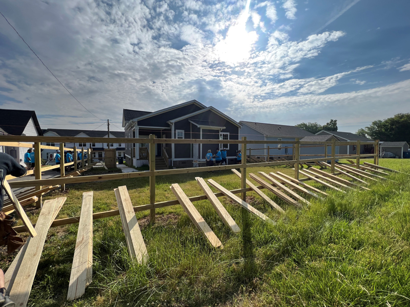 Construction of fence being built by F&M Bank teammates 