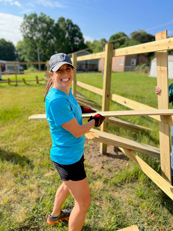 F&M Bank teammate building a fence 